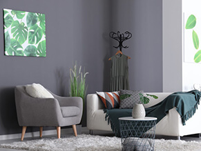 Functional_Grey_Living_Room_fluffy_rug_grey_chair_white_couch_green_throw_artwork_cushion 